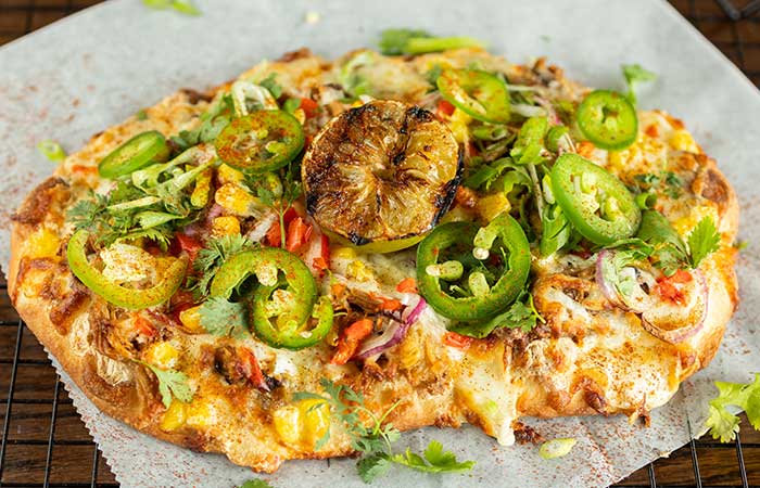 A restaurant menu favorite in Monticello MN: flatbread pizza with jalapeños, onions, and lemon.